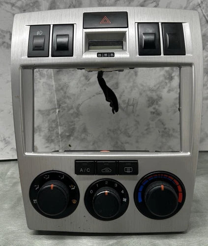 Hyundai Tiburon A/C Climate Control Radio Bezel (2003–2006) – Genuine OEM