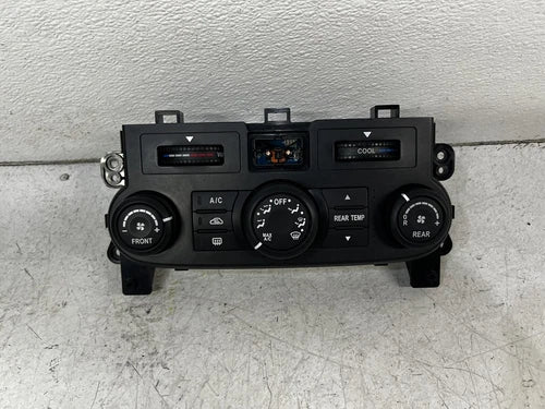 Kia Sedona 3 zone manual climate A/C temp panel control unit (2006–2012) – Genuine OEM