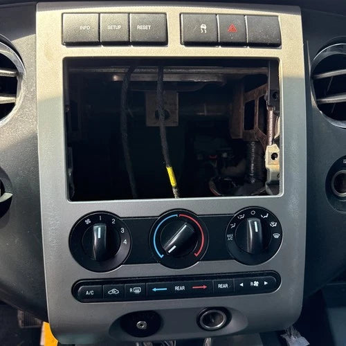 to 2014 Ford Expedition Climate Control w/ Radio Bezel i4969 DG (2007) – HVAC Replacement Part